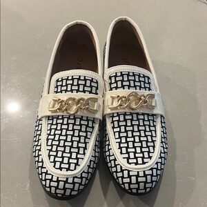 Stylish Black and White Loafers with Gold Accent